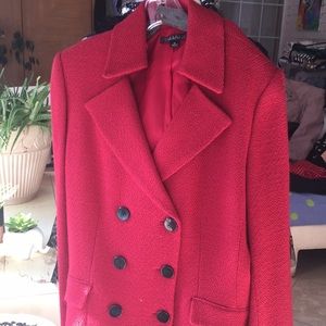 Striking suit with red jacket and black slacks